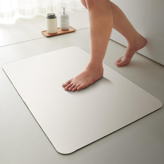 TYUU White Bath Mat, Bathroom Rugs Non Slip Washable Thin Absorbent Quick Dry Bath Mat Fits Under Door Bathroom Floor Mat Perfect for Bath, Shower, or Sink 24"x36" White